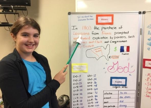 Chloe with school project