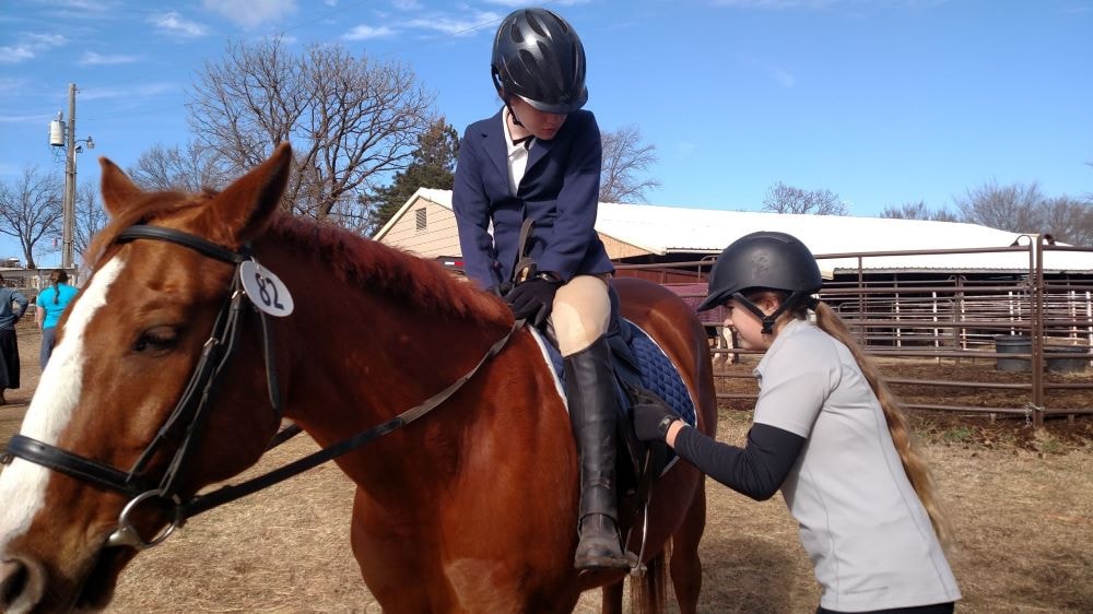 Chloe helping a friend